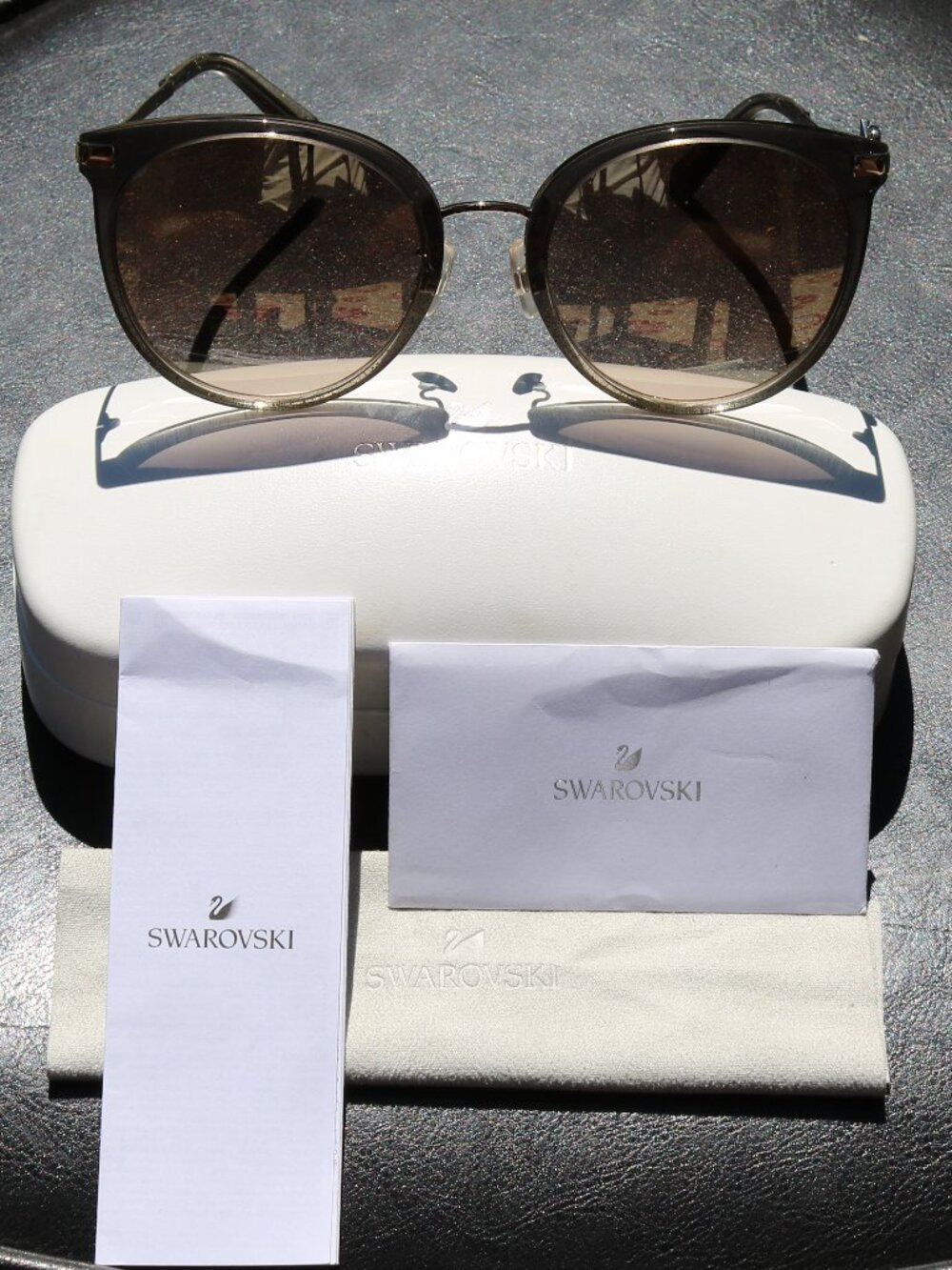 Swarovski Sunglasses new with Box and Papers